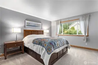 primary bedroom with ensuite bath and walk in closet