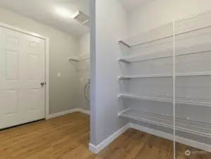 Walk in pantry and laundry area.