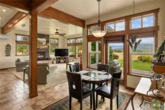 Breakfast nook area just off of the kitchen has access to the stamped concrete patio! You'll find the relaxing hot tub there. Perfect for an evening dip after snowmobiling or being on the lake all day!