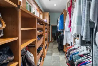 Primary Suite walk-in closet with a fantastic closet system.