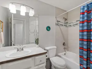 Gorgeous custom tile shower surround.