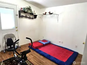 Third bedroom is being used as an exercise room.