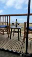 Relax on your private deck with a view of the dunes and the ocean.  It doesn't get better than this!