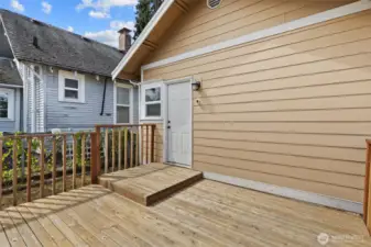 Bid deck in the back with a fully fenced portion perfect for pets.