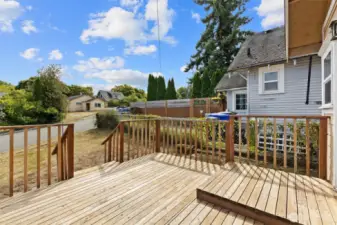 Bid deck in the back with a fully fenced portion perfect for pets.