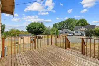 Bid deck in the back with a fully fenced portion perfect for pets.