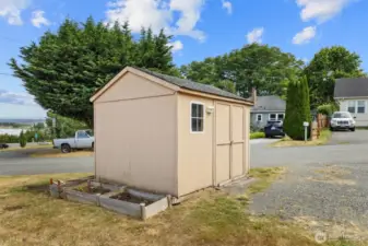 Storage shed for lawn equipment or whatever you would like.