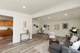 Living room open to kitchen and dining area