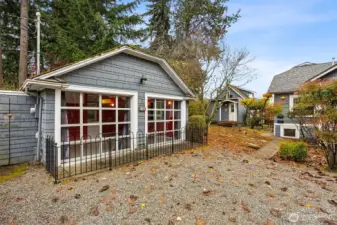This can be a one car garage with shop space  OR a studio apartment with 3/4 bath and laundry!
