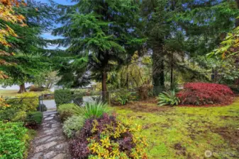 looking from the front door and deck, a private sanctuary awaits.