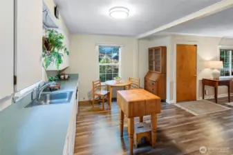 back door looking through the kitchen to the front door.