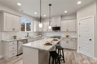 Convenient island with eating area and walk-in pantry