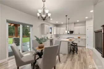Kitchen features a casual dining area
