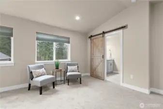 Sitting area, vaulted ceilings and oversized windows