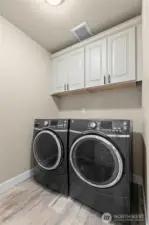 Covered area with lighting is ready for your BBQ