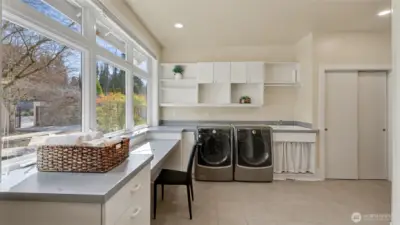 Spacious utility room on main floor.