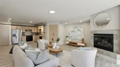 Large basement with kitchen and fireplace.