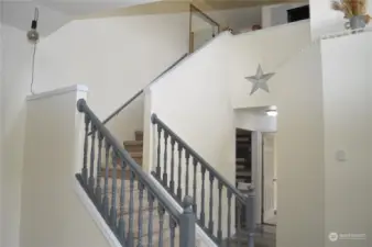 Nice wide staircase greets you at the front door.