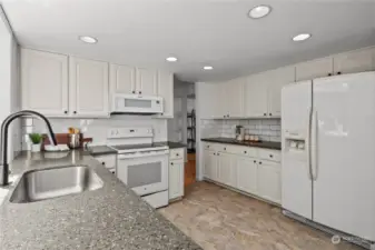 Tons of storage and counter space with all matching white appliances!