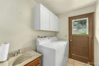 Laundry Room. Door leads to side yard.