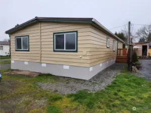 Front West side.  Partial Fence of neighboring resident