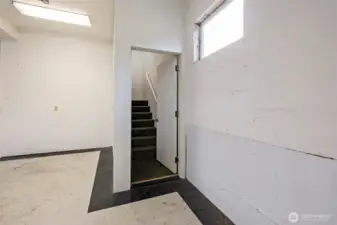 These stairs at the back of the garage take you to the second bedroom suite.