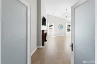 French doors into the main floor primary bedroom