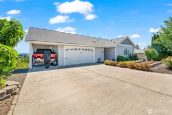 Lots of driveway parking, plus an attached carport!