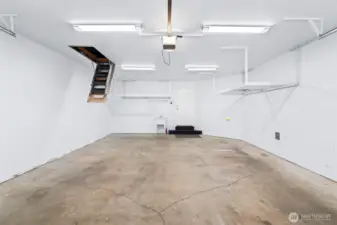 Don't miss the pull down ladder with access to roughed-in man cave! There's also a hidden door to more dry storage.