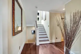 Main floor landing to stairs leading upstairs or downstairs