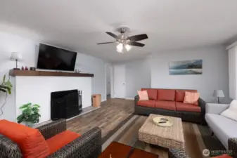 Beautiful front room w/fireplace.
