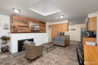 Additional sitting/family room featuring fireplace.