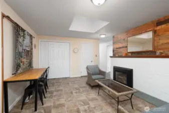 Additional sitting/family room featuring fireplace.