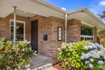 Welcoming covered front door entry