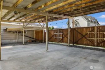 Covered carport-use a covered patio area, or for parking off the alley.