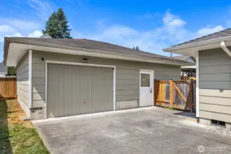Detached garage with work space/shop.