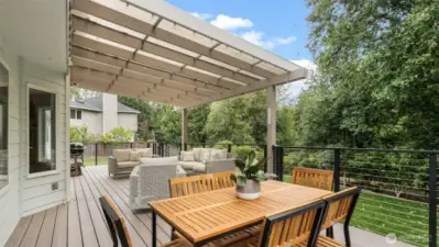 Large Wraparound deck with covered patio.