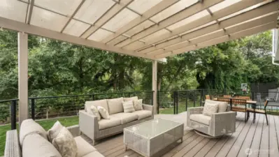 Large Wraparound deck with covered patio.