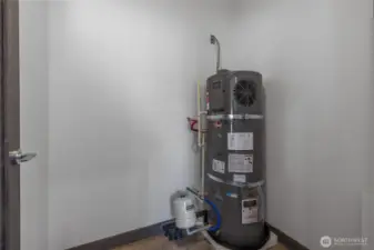 New water heater and plenty of space for washer, dryer, and food pantry/storage