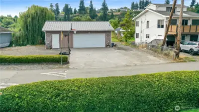 1/2 acre lot with 2 car garage/shop