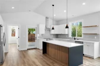 Oversized Island with quartz counters.