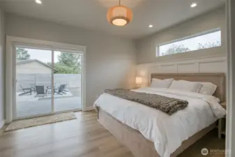 Gorgeous primary suite with access to the covered back deck