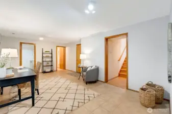 Spacious bonus room with tile floors, soft wall colors, and plenty of natural light. Perfect for a home office, play room, or guest space with flexibility for any lifestyle need.