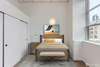 Enjoy all this natural light. Bedroom easily fits a king bed with 1 night stand or a queen with 2. Virtually staged.