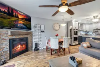 Another view of the lovely fireplace, dining area and living room