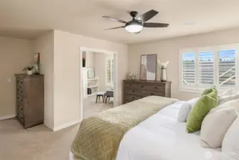 Pleasant sitting room or work/flex space off the primary suite