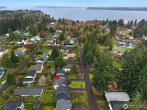 Aerial view highlighting the home’s location within the Beachcrest community and proximity to private amenities.