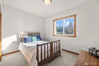 Bedroom #1 spacious and of course wood wrapped windows and beautiful woodwork throughout