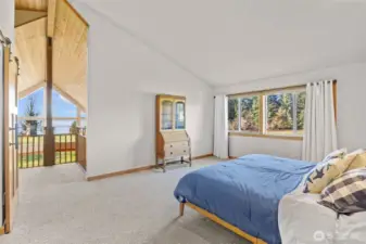 Unwind in the luxurious primary suite with vaulted ceiling, views, 5-piece ensuite