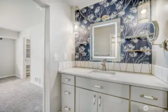 Bathroom with his and hers vanities